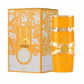 Yara Tous sweet tropical perfume in bright packaging by Lattafa, featuring luxurious design and vibrant colors.