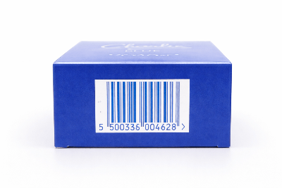 Revlon Charlie Blue perfume box showcasing the elegant blue packaging and barcode for product identification.