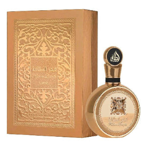 luxury unisex perfume Fakhar Gold by Lattafa in elegant packaging with ornate design.